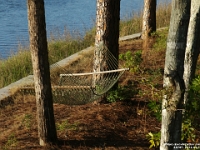 28767CrLe - Vacation at Kiawah Island, SC - Neighbour's hammock   Each New Day A Miracle  [  Understanding the Bible   |   Poetry   |   Story  ]- by Pete Rhebergen